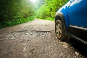 Car Wheel and Pothole Road in Baltimore, MD